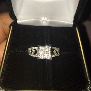 Never Worn .17 ct diamond and 14 kt gold ring